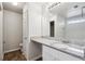 Well-lit bathroom features granite countertops, modern fixtures, and ample storage space at 2704 River Summit Ln, Decatur, GA 30034