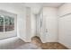 Inviting foyer with neutral walls, tiled floors, and ample closet space at 2704 River Summit Ln, Decatur, GA 30034