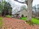 Beautiful backyard featuring a covered porch, patio and expansive lawn, great for outdoor entertaining at 2751 Davis Rd, Marietta, GA 30062