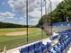 Image of a baseball field featuring bleacher seating and pristine green surroundings at 2751 Davis Rd, Marietta, GA 30062