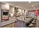 Modern kitchen featuring stainless steel appliances, a center island with seating, and ample counter space at 2751 Davis Rd, Marietta, GA 30062