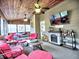 Cozy sunroom featuring fireplace and mounted TV at 2751 Davis Rd, Marietta, GA 30062