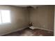 Damaged bedroom featuring a window, damaged walls, and damaged hardwood floors at 3005 Flat Shoals Rd, Atlanta, GA 30349