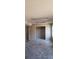 Large room with open closet ready for renovation with slider doors at 3005 Flat Shoals Rd, Atlanta, GA 30349