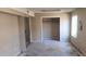 Large room with open closet ready for renovation with slider doors at 3005 Flat Shoals Rd, Atlanta, GA 30349