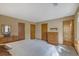 Spacious bedroom featuring 3 closets and neutral carpet at 921 Forest Park Ln, Suwanee, GA 30024