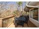 Large back deck with dining set and lake views at 100 Silverbell Ct, Roswell, GA 30075