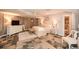 Spacious main bedroom with accent wall, ceiling fan and tiled floor at 100 Silverbell Ct, Roswell, GA 30075