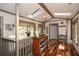 Inviting hallway with skylights, hardwood floors, and beautiful natural light at 100 Silverbell Ct, Roswell, GA 30075