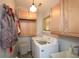 Functional laundry room with modern appliances and storage cabinets at 100 Silverbell Ct, Roswell, GA 30075