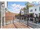 Exterior shot highlighting a balcony with contemporary metal railing, wood decking and modern exterior at 2333 Mason Dr # D26, Atlanta, GA 30316