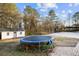 Backyard features a trampoline, basketball court, fire pit and a storage shed at 2778 Macland Rd, Dallas, GA 30157