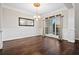 Formal dining room with hardwood floors, wainscoting, and a chandelier at 2778 Macland Rd, Dallas, GA 30157