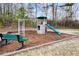 Neighborhood playground with slide, climbing wall and swings at 2778 Macland Rd, Dallas, GA 30157