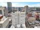 A multi-story building sits among modern city skyline with a partial view of the city at 57 Forsyth Nw St # 14D, Atlanta, GA 30303