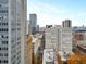 A view of a multi-story building in a downtown setting with streets and other buildings at 57 Forsyth Nw St # 14D, Atlanta, GA 30303