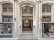 Ornate building entrance with detailed architectural features and storefronts at 57 Forsyth Nw St # 14D, Atlanta, GA 30303