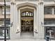 Elegant building entrance featuring classic architectural details and a revolving door at 57 Forsyth Nw St # 14D, Atlanta, GA 30303