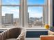 Enjoy this stunning downtown view from the comfort of this living room at 57 Forsyth Nw St # 14D, Atlanta, GA 30303