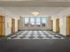 Elevator waiting area featuring multiple elevators and a patterned floor at 57 Forsyth Nw St # 14D, Atlanta, GA 30303