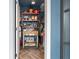 Cozy pantry with organized shelving and a rolling utility cart at 57 Forsyth Nw St # 14D, Atlanta, GA 30303