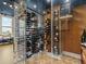 Custom wine cellar with glass enclosure, herringbone floors, and climate control at 57 Forsyth Nw St # 14D, Atlanta, GA 30303