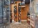 Stunning wine cellar featuring custom racking, glass enclosure, and herringbone floors at 57 Forsyth Nw St # 14D, Atlanta, GA 30303