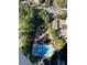 Aerial view of community featuring a pool, seating areas, and lush greenery at 795 Hammond Dr # 1712, Atlanta, GA 30328