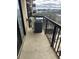 A balcony with an air conditioner unit and a view of the cityscape beyond the railing at 795 Hammond Dr # 1712, Atlanta, GA 30328