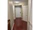 Inviting entrance foyer featuring hardwood floors and ample closet space at 795 Hammond Dr # 1712, Atlanta, GA 30328