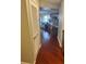 Hallway with wood floors leading to the kitchen and living room at 795 Hammond Dr # 1712, Atlanta, GA 30328