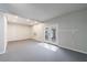 Finished basement with recessed lighting, glass doors and convenient access to the outdoors at 3044 Windfield Cir, Tucker, GA 30084