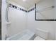 Bright bathroom with tile floors, a shower tub, and a sink vanity at 3044 Windfield Cir, Tucker, GA 30084