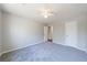 This spacious bedroom has neutral walls and carpet, with a ceiling fan and ample natural light at 3044 Windfield Cir, Tucker, GA 30084