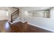 Spacious foyer with hardwood floors, staircase, and an open view to the living spaces at 3044 Windfield Cir, Tucker, GA 30084