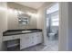 The main bathroom includes a modern vanity and separate toilet and shower area at 3044 Windfield Cir, Tucker, GA 30084