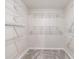 Walk-in closet features adjustable shelving and ample storage space at 3044 Windfield Cir, Tucker, GA 30084