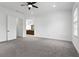 Bright bedroom with ensuite bathroom and carpet at 145 Rose Garden Ln, Alpharetta, GA 30009