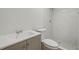 Modern bathroom featuring a stand-up shower with white subway tiles and gray vanity sink at 6605 Black Bend Ct, Riverdale, GA 30274