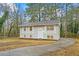 Charming one-story home with a well-manicured lawn and inviting curb appeal at 6605 Black Bend Ct, Riverdale, GA 30274