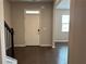 Inviting foyer with hardwood floors, staircase, and bright natural light at 738 Basswood Ave, Mcdonough, GA 30252