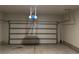 Spacious two-car garage with modern door and opener, ready for your vehicles and storage needs at 738 Basswood Ave, Mcdonough, GA 30252