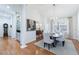 Elegant dining room features hardwood floors, a chandelier, and a large window with ample natural light at 3101 Howell Mill Nw Rd # 327, Atlanta, GA 30327
