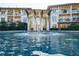 Beautiful condo complex view with a central fountain feature and well-maintained landscaping at 3101 Howell Mill Nw Rd # 327, Atlanta, GA 30327