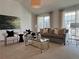 Bright living room with a neutral color palette, comfortable seating, modern decor, and large windows at 3101 Howell Mill Nw Rd # 327, Atlanta, GA 30327