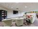 Cozy recreation room with comfortable seating, a large TV, and a bookcase with recreational possibilities at 3101 Howell Mill Nw Rd # 327, Atlanta, GA 30327