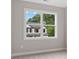 Bright bedroom with a large window overlooking the backyard at 1322 Parc Bench Rd, Atlanta, GA 30316
