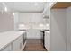 Beautiful kitchen featuring stainless steel appliances, an island, white subway tile backsplash, and modern pendant lighting at 1322 Parc Bench Rd, Atlanta, GA 30316