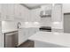 Bright kitchen boasts white cabinets, subway tile backsplash, and stainless steel appliances at 1322 Parc Bench Rd, Atlanta, GA 30316