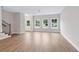 Spacious living room featuring hardwood floors, large windows and an open floor plan at 1322 Parc Bench Rd, Atlanta, GA 30316